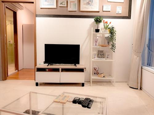 TV a/nebo společenská místnost v ubytování Vortex klcc by kl