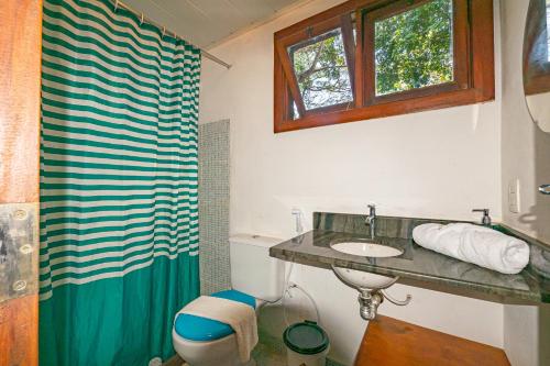 Koupelna v ubytování Recanto dos Pássaros Zen Apartamentos em meio de Natureza