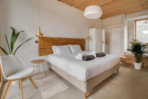 Ένα ή περισσότερα κρεβάτια σε δωμάτιο στο Casa Duna