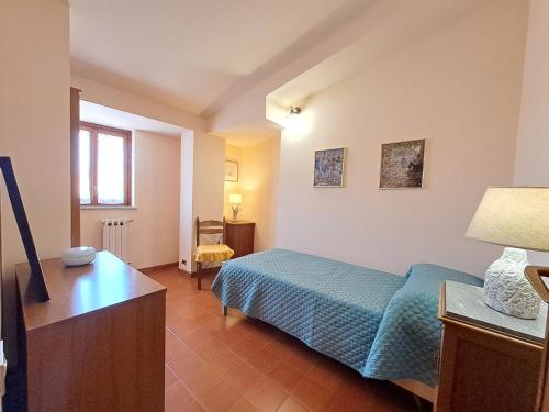 A bed or beds in a room at Mirèa Apartment by Casa in mente