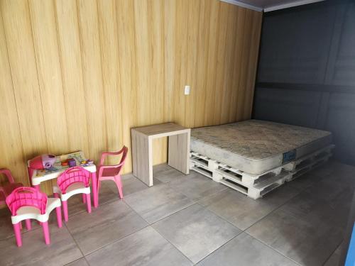 Ένα ή περισσότερα κρεβάτια σε δωμάτιο στο Casa Container