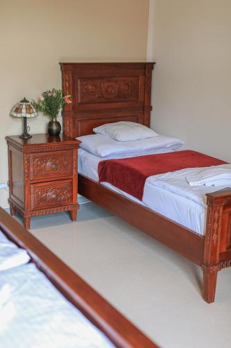 Una cama o camas en una habitación de Hotel Klášter Želiv