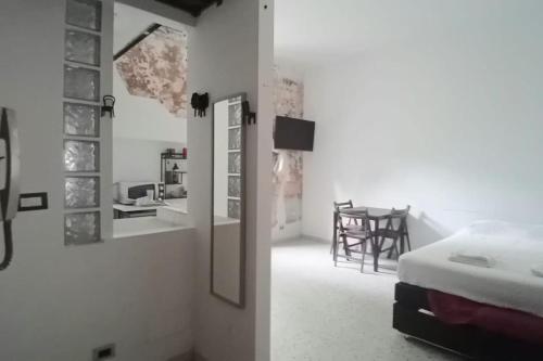 Ένα ή περισσότερα κρεβάτια σε δωμάτιο στο Roma Garbatella - Garby Loft