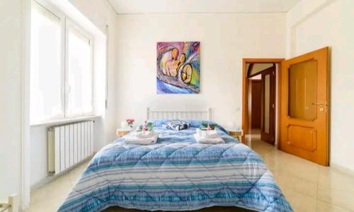 A bed or beds in a room at Il Soffione Home