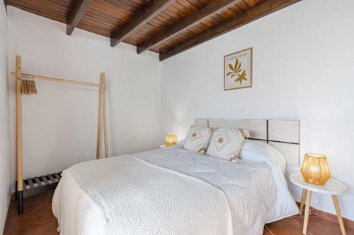 Ένα ή περισσότερα κρεβάτια σε δωμάτιο στο El sendero de Tejina - By Feel your holidays