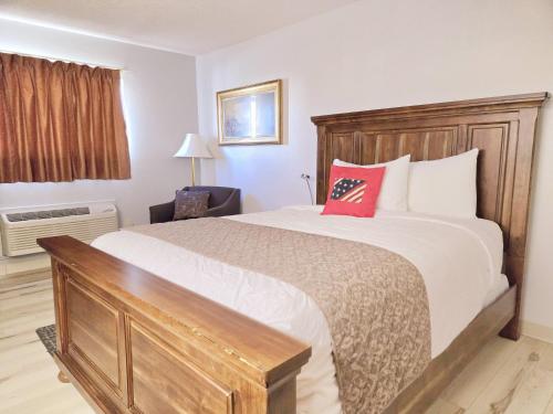 American Inn Ozarkにあるベッド