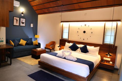 Ein Bett oder Betten in einem Zimmer der Unterkunft Bay View Suites, Vythiri, Wayanad