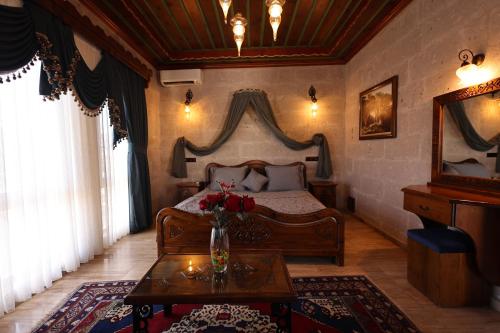 Cama o camas de una habitación en Cappadocia Inn Cave Hotel