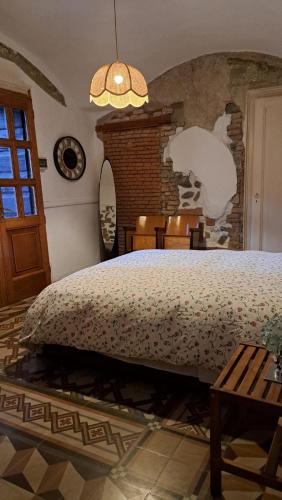 Postel nebo postele na pokoji v ubytování Appartamento in Corte Storica