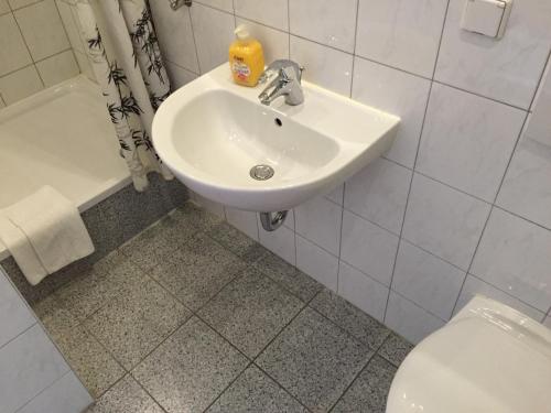 Salle de bains dans l'établissement Pension Classic