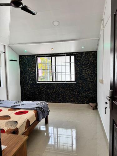 Ein Bett oder Betten in einem Zimmer der Unterkunft Dream House FORT KOCHI