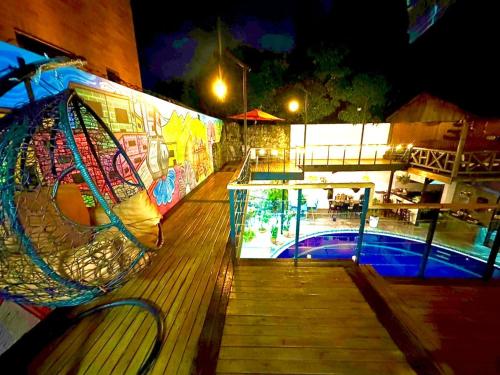a view of a swimming pool at night at Casa Boutique La Corona Medellin in Envigado