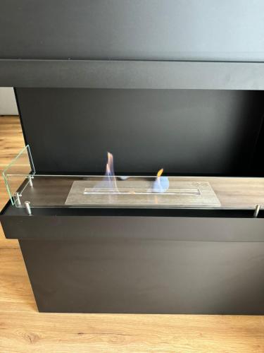 two candles are sitting on top of a table at Schöne Ferienwohnung in Schottwien