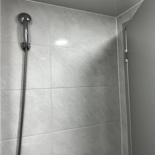 Ένα μπάνιο στο NJ Affordable and cozy accommodation near Nakseongdae Station