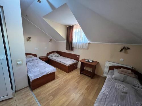 Postel nebo postele na pokoji v ubytování Pallada Motel