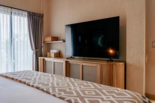 Телевизор и/или развлекательный центр в La Gracia Hotel & Spa