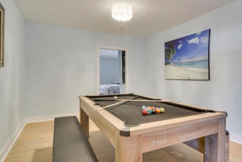 a ping pong table in a room with a pool table at Indian Rocks Beach Oasis - 2 Blocks to Beach! in Clearwater Beach
