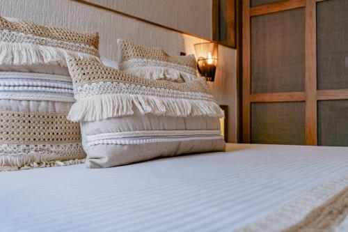 Кровать или кровати в номере La Gracia Hotel & Spa