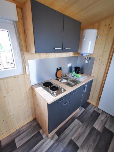Kuchyň nebo kuchyňský kout v ubytování Tiny Guesthouse Herdt Euerbach