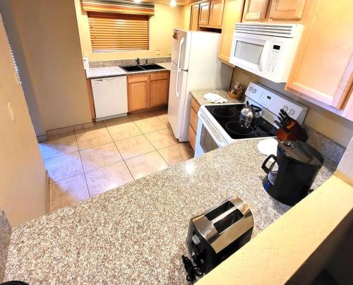 a kitchen with a counter top with a appliance on it at Villas of Sedona in Sedona