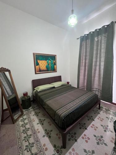 Ένα ή περισσότερα κρεβάτια σε δωμάτιο στο Palazzo Orangea 2 piano