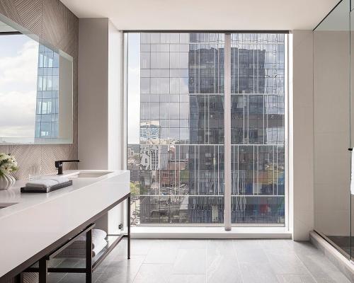 a kitchen with a large window with a view of a city at Four Seasons Hotel Nashville in Nashville