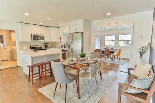 a kitchen and dining room with a table and chairs at Spacious Waterfront Atlantic City Living with Rec Room in Atlantic City