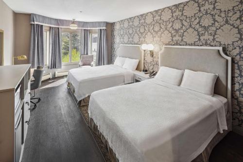 Postel nebo postele na pokoji v ubytování Hotel Seward