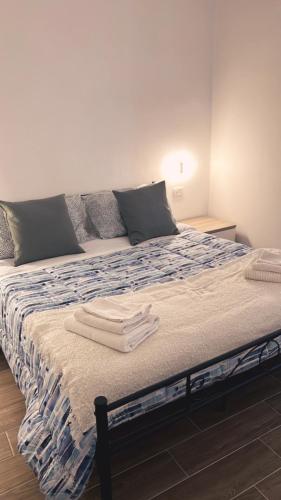 Postel nebo postele na pokoji v ubytování Casa della nonna bed & breakfast
