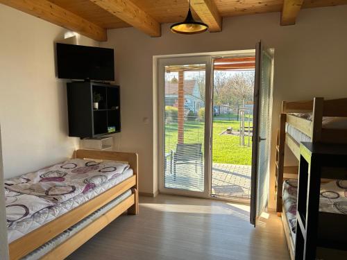 Postel nebo postele na pokoji v ubytování Apartmány Levandule