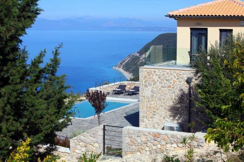 a villa with a view of the ocean at Point of View Cassiopeia in Drymon
