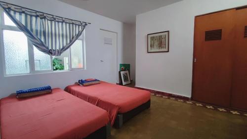 Postel nebo postele na pokoji v ubytování Ninfas 371