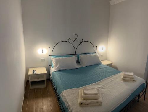 Postel nebo postele na pokoji v ubytování Casa della nonna bed & breakfast