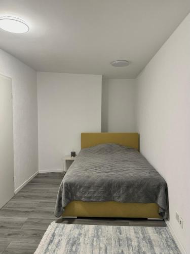 Ένα ή περισσότερα κρεβάτια σε δωμάτιο στο GAIA Apartment