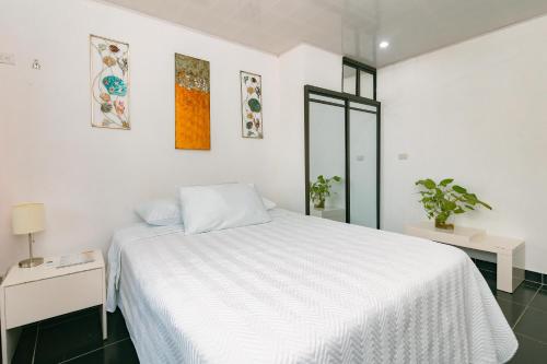 Una cama o camas en una habitación de Vista del Pacifico.
