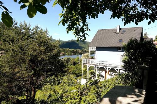 a house with a view of a river at Mountains Apartment Elb Canyon in Ústí nad Labem