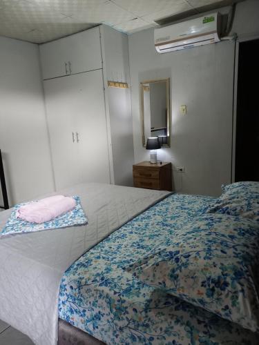 Un ou plusieurs lits dans un hébergement de l'établissement Apartahotel los cactus