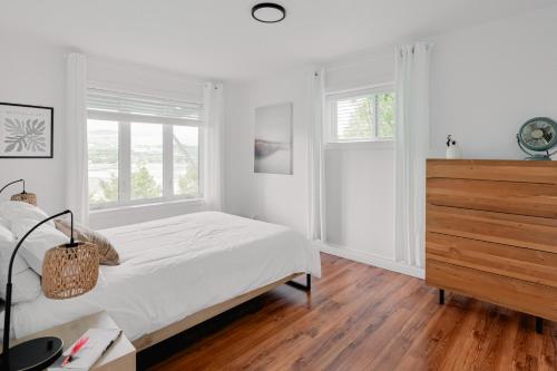 Ein Bett oder Betten in einem Zimmer der Unterkunft Les Marées