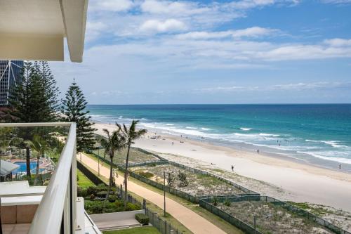 a view of the beach from the balcony of a condo at Viscount on the Beach in Gold Coast