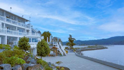 a view of a hotel and the water at Sooke Harbour House in Sooke