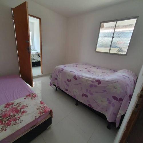Katil atau katil-katil dalam bilik di aluguel por temporada em porto de galinhas