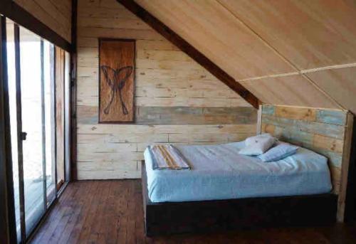 Postel nebo postele na pokoji v ubytování Ohana frente al mar