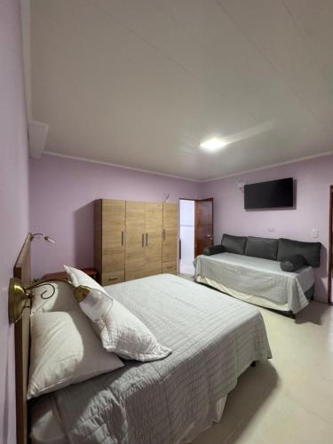 Ένα ή περισσότερα κρεβάτια σε δωμάτιο στο Apartamento Doña Marí