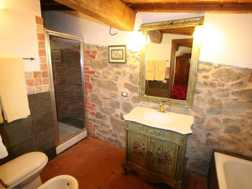 a bathroom with a sink and a shower at Modern Holiday Home in Ciggiano Italy with Private Pool in Ciggiano