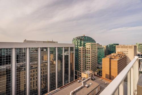 a view of a city from the balcony of a building at Luxury 2-Bedroom Penthouse Downtown with Free Parking in Ottawa