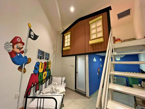 a bedroom with a mario room with a bunk bed at Smile Hotel Shah Alam ICity in Shah Alam