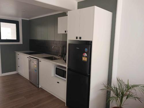 Η κουζίνα ή μικρή κουζίνα στο Lagoon Apartments