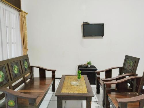 Una televisión o centro de entretenimiento en Villa Estria