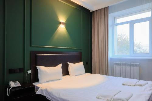 Giường trong phòng chung tại Hotel Vivaldis