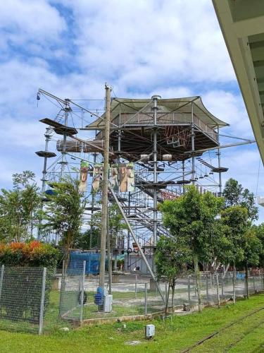 Κήπος έξω από το MayaBay Residence Splash Mania Gamuda Cove Homestay by Ara